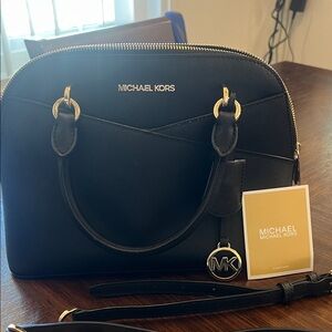 Michael Kors Black Satchel with Gold Accents
